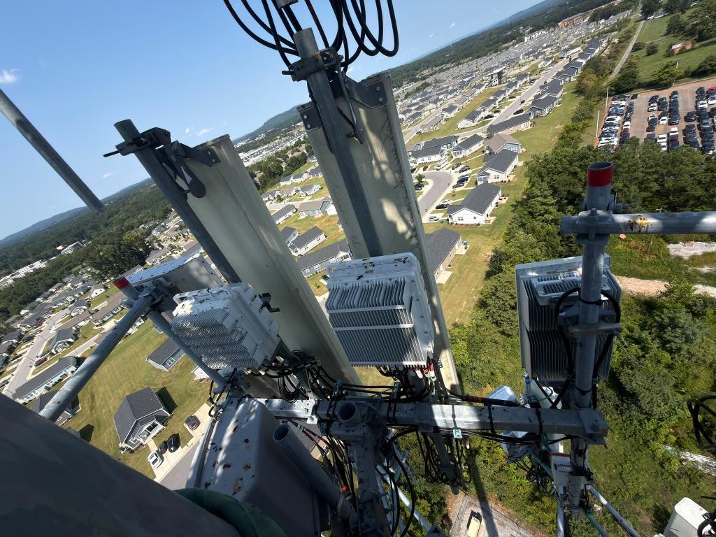 Verizon tower sector before 5G equipment installation above a residential neighborhood