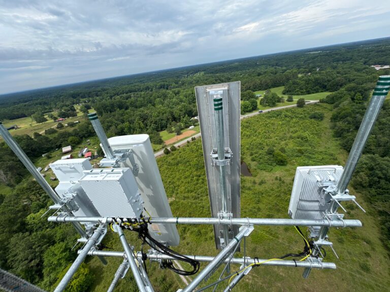 Tower Tigers Crew technician completing a Verizon antenna installation on a tower in Alabama
